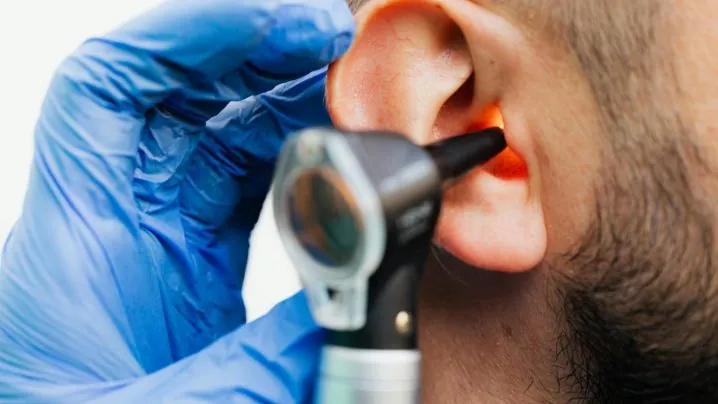 A Patient Having Ear Examination